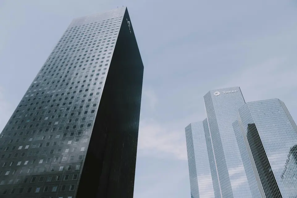 Modern glass buildings representing corporate clients served by NNOCONN
